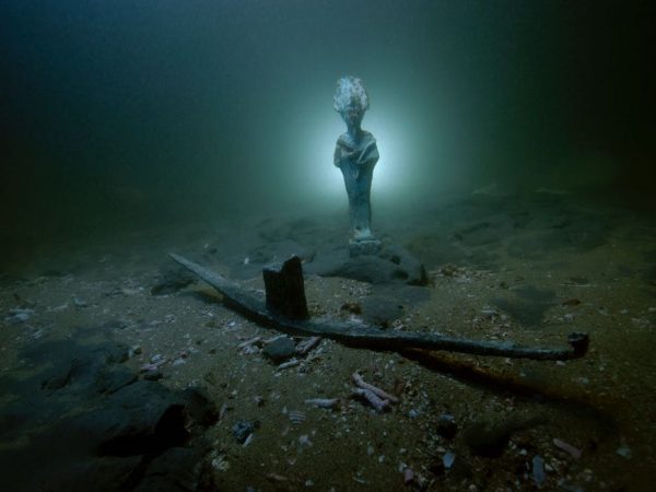 God Osiris Bronze Statuette and Lead Votive Barque Thonis-Heracleion Egypt. ChristophGerigk © Franck Goddio - Hilti Foundation